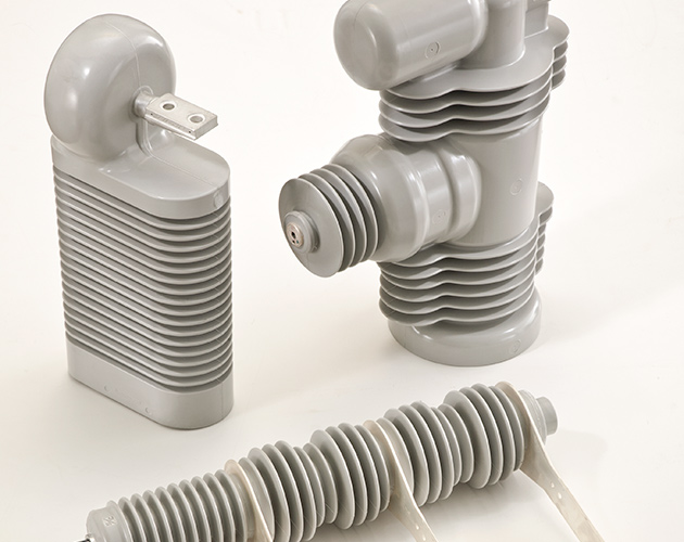 three cypoxy polymer insulator and custom components for indoor and outdoor distribution, four point eight k-V through thirty four point five k-V cypoxy polymer insulator, cypoxy insulator, polymer insulator, insulator, custom components for indoor and outdoor distribution, custom components for indoor distribution, custom components for outdoor distribution, 4.8 kV 34.5 kV